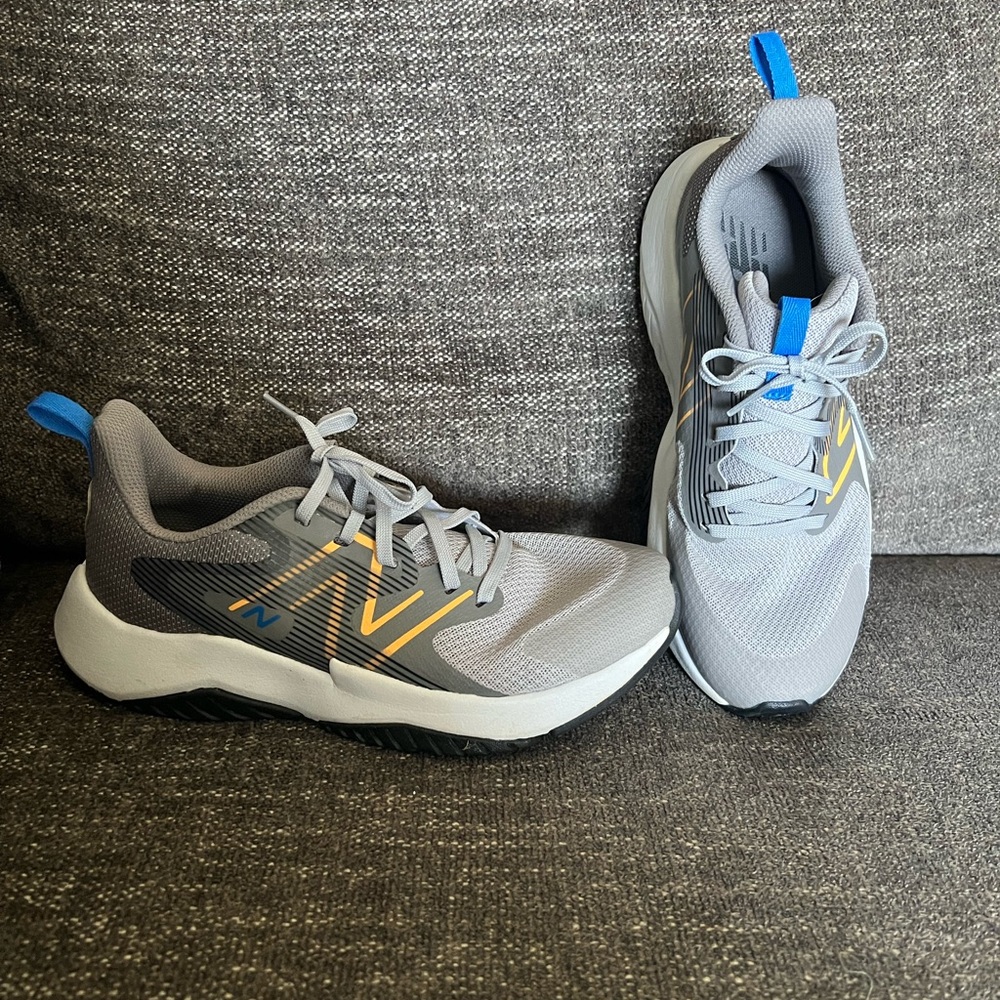 New Balance Kids' Rave Run v2 Gray Sneakers with Blue and Yellow Accents